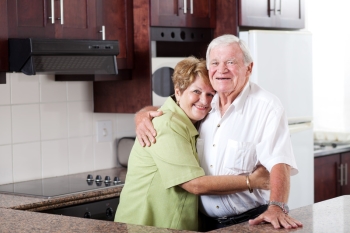 Older couple living in affordable Texas senior apartment.