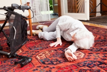 Elderly woman that has fallen down.