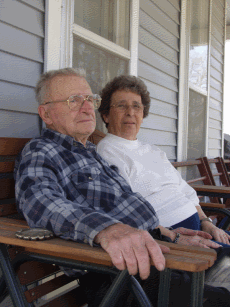 Elderly couple sitting